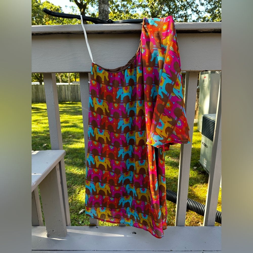 One shoulder, multicolored, bell sleeved dress. Loose fitting. Smoke free home.